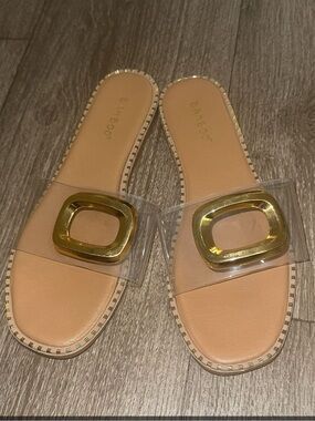 BAMBOO Nude Clear Strap Slide Sandals with Gold Buckle